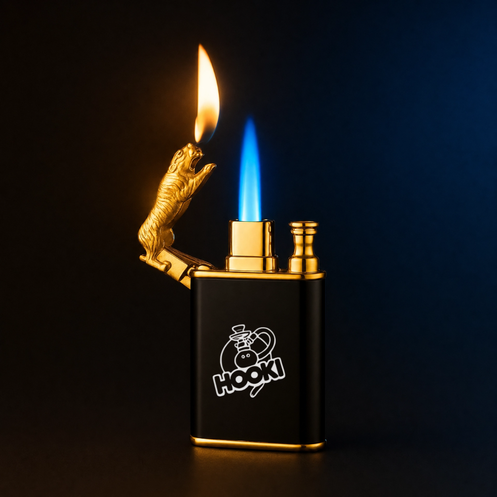 A black and gold HOOKi lighter with a gold tiger-shaped flame lighter and a blue jet flame, set against a dark background.